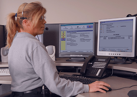 a police officer using the OpenFox® Sex Offender Registry 2.0