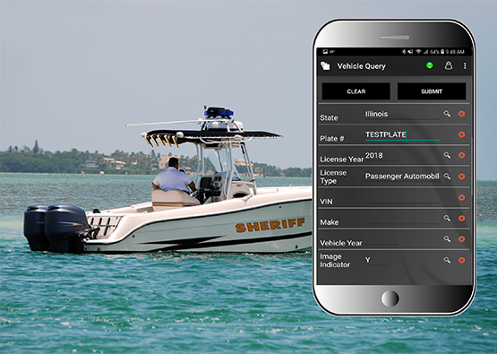 a sheriff using the OpenFox® CLAW application while patrolling the sea
