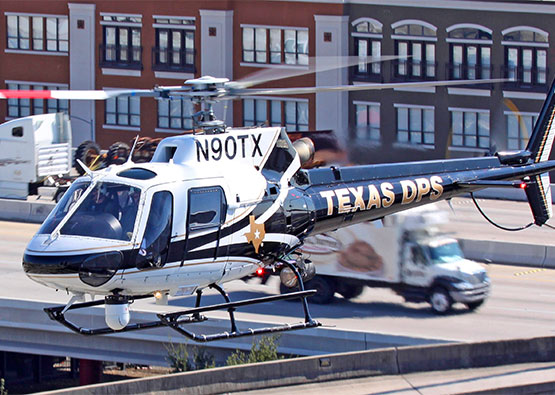 a Texas DPS helicopter pilot using the OpenFox® Message Switch System