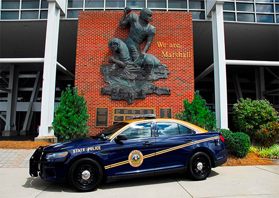 a West Virginia state police car outside of a police office
