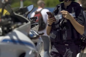 police officer on mobile while on duty