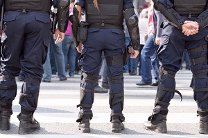 policemen standing near crowd