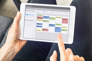 tablet computer with planning of the week with appointments