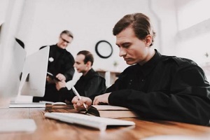 police officers working on computer systems